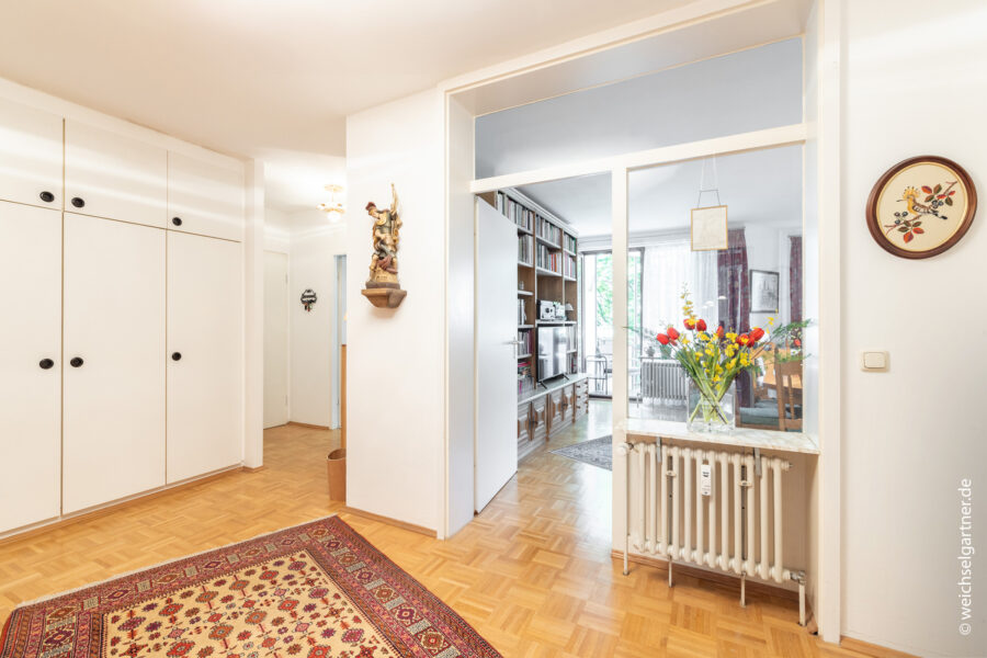 Wohnen am Isarhochufer: Vermietete Eigentumswohnung mit West-Balkon und TG-Einzelstellplatz - Mit praktischen Stellflächen