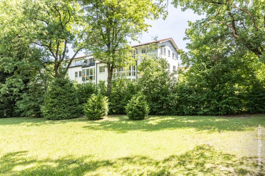 Erbpacht: Energieeffizente (A+), top geschnittene und bezugsfreie Wohnung mit Ausblick ins Grüne - Blick auf den Wintergarten