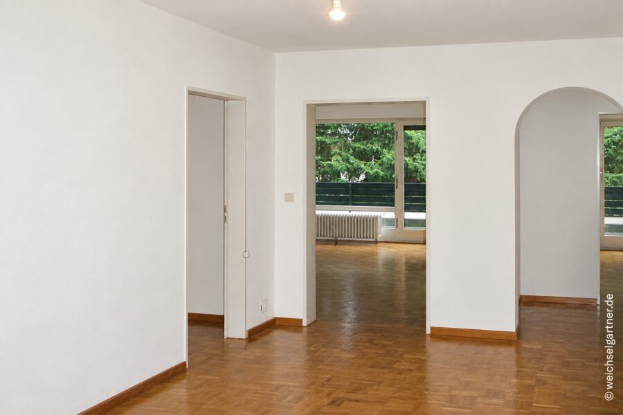 Großzügige, vermietete 3-Zimmer-Wohnung mit zwei Balkonen und TG-Einzelstellplatz in grüner Wohnlage - Diele: KI-bearbeitet