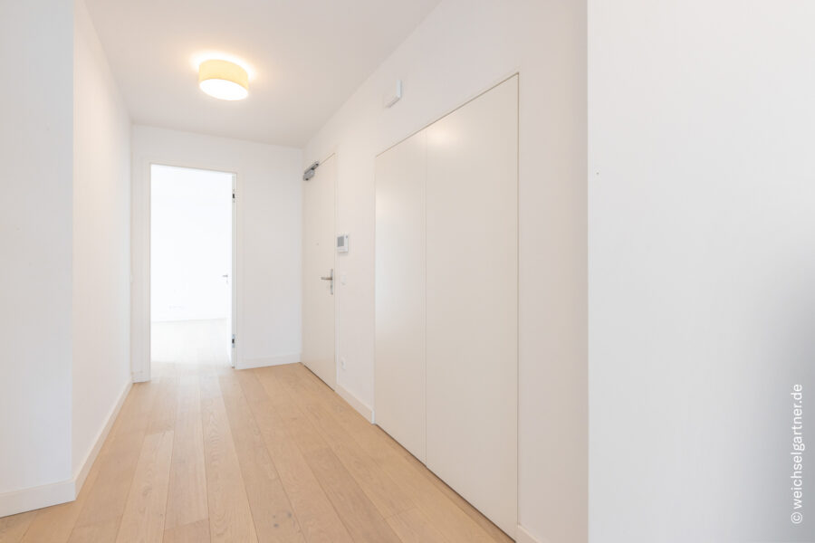 Hochwertige Gartenwohnung mit Süd-Ausrichtung, exklusiver Ausstattung und Energieeffizienzklasse A - Eingangsbereich