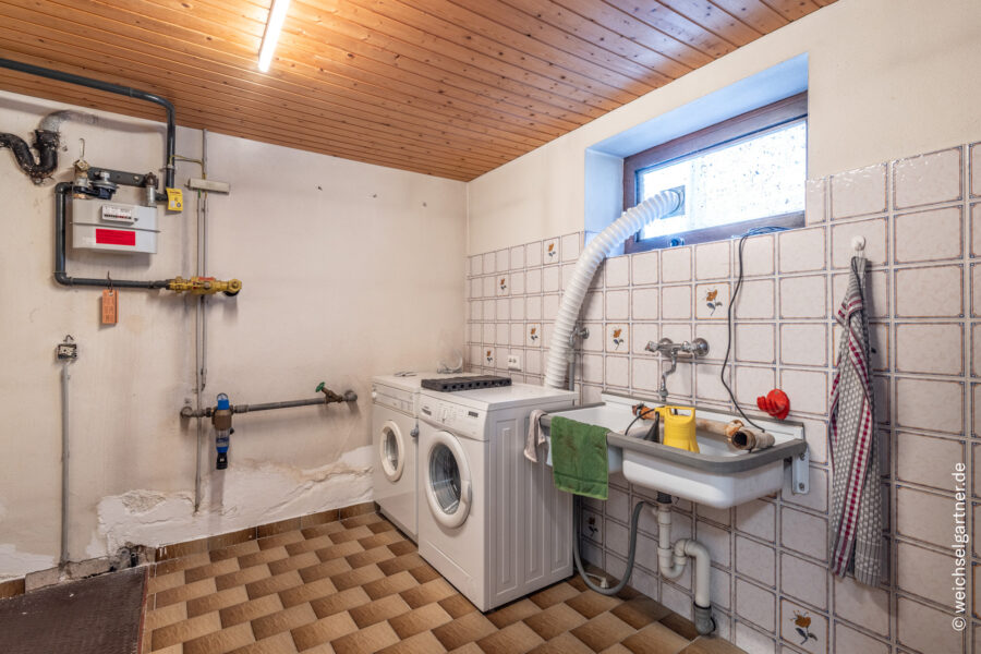 Freistehendes Einfamilienhaus auf idealem Süd-Grundstück in ruhiger Anliegerstraße - Waschküche