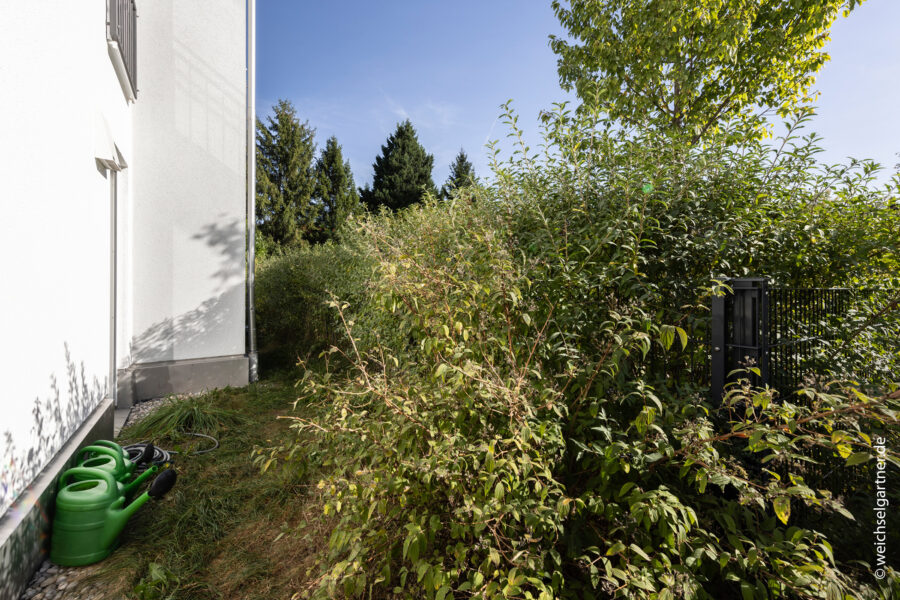 Schöne und helle Gartenwohnung mit idealer Süd-Ost-Ausrichtung - Seitliche Hausansicht