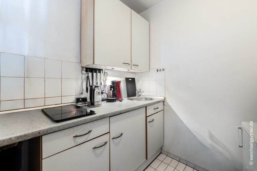 Vermietetes Appartement mit Südwest-Loggia in beliebter Wohnlage - Küche mit Einbauküche