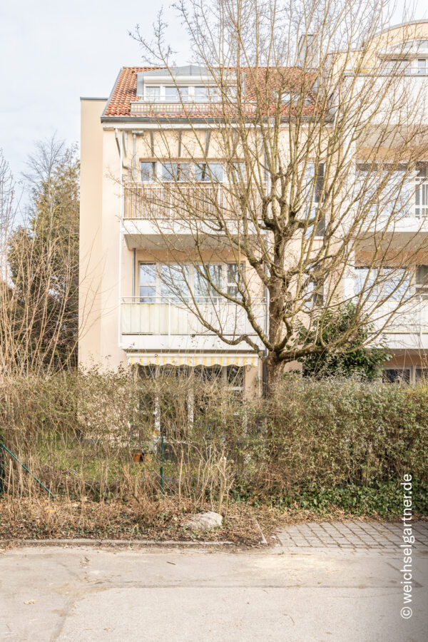 Charmante Eigentumswohnung mit großem Privatgarten - Ansicht des Wohnhauses